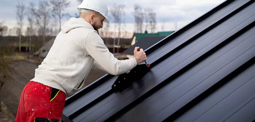 Tin Roof Ridge Cap Installation in Oak Forest